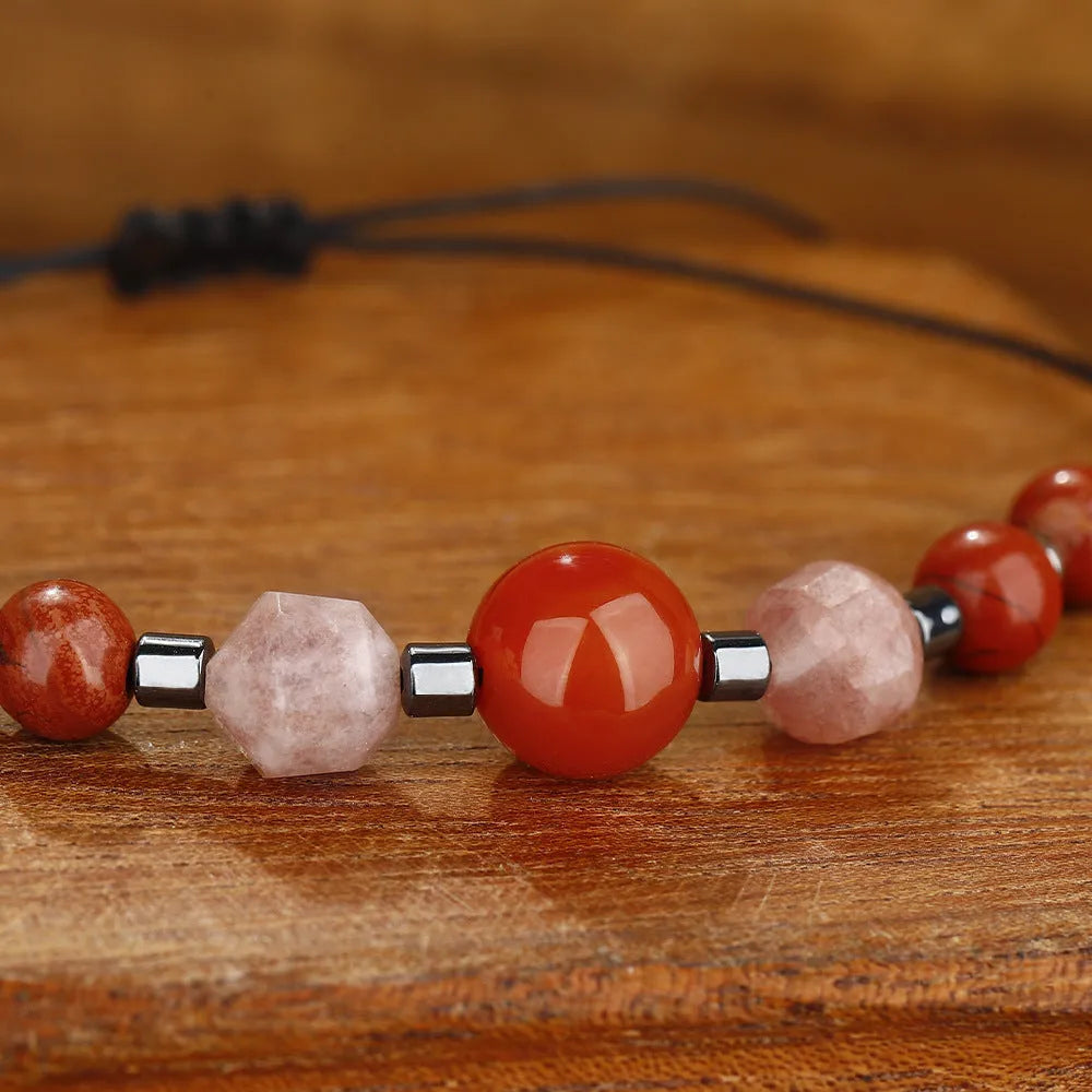 Red stone bracelet with sunstone, redstone and copper beads in geometric design