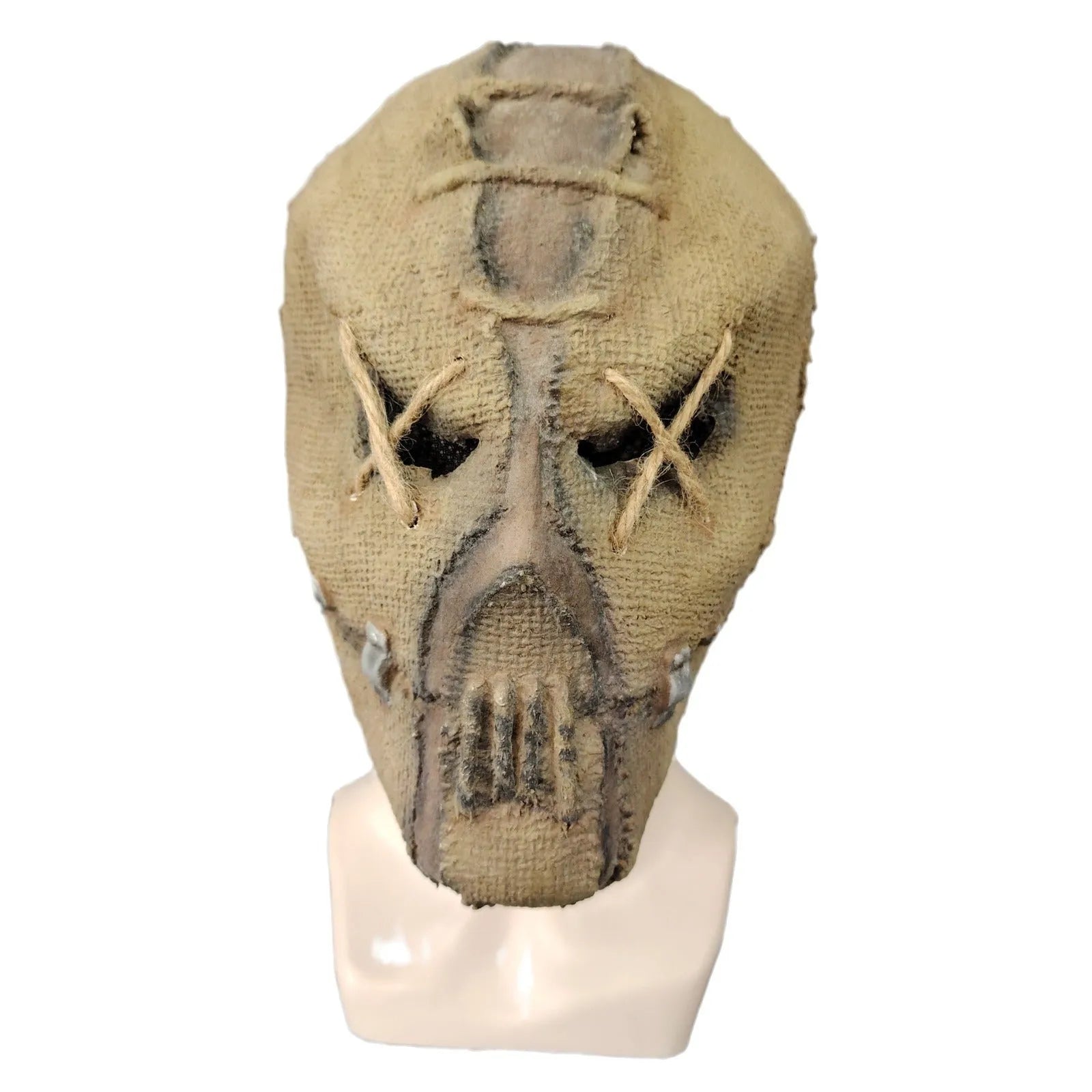 Latex Halloween horror mask with detailed scar skull design on a white background.