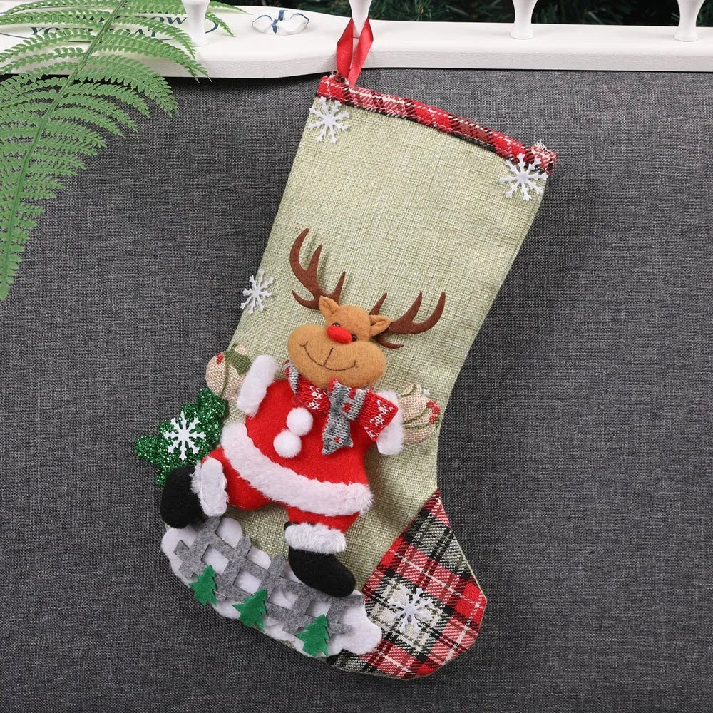 Hand-sewn cloth Christmas socks in sequin and letter styles, including a large red sock for gift bag use