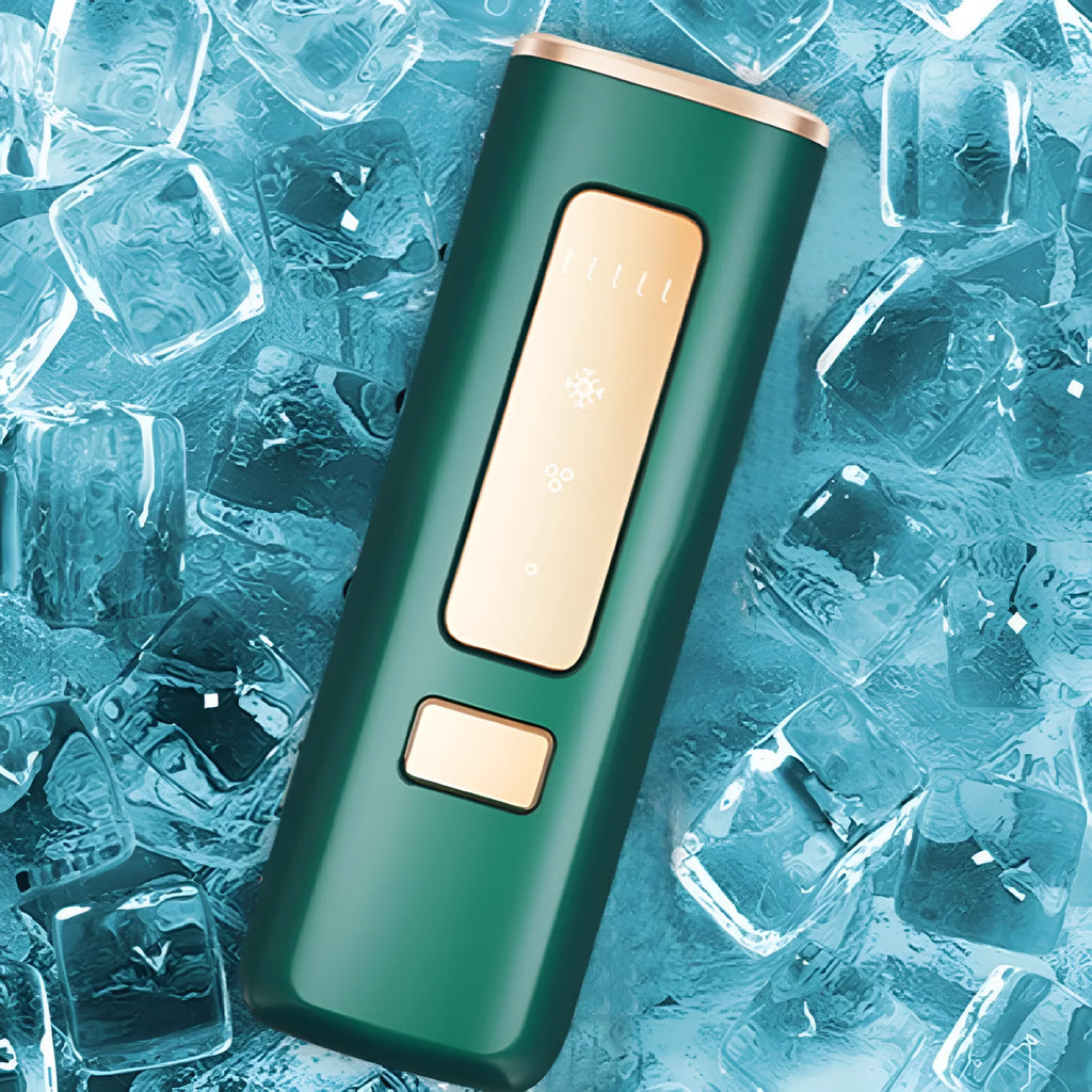 Laser hair remover permanent freezing point sapphire home use device in dark green or green, 150x67x36mm, with sunglasses and shaving knife.