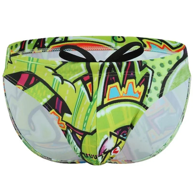 Printed men's swimming trunks in polyester fabric showing colour options Cyber, Ice Cream, Streamer, and Skull.