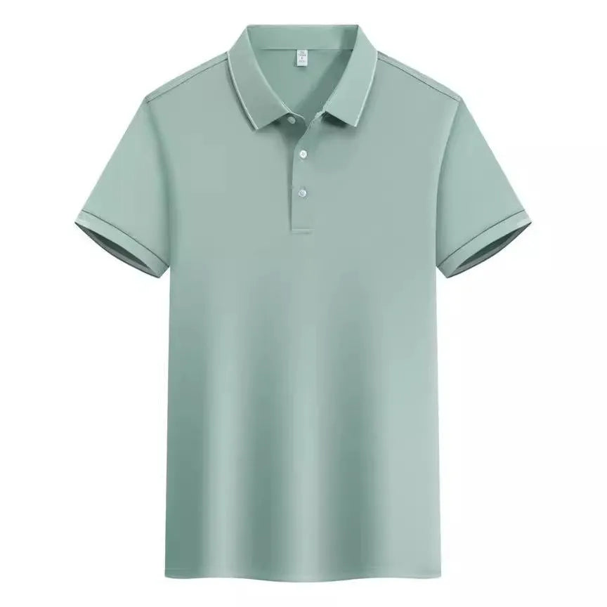 Man wearing a loose fit apricot coloured short sleeve cotton blend polo shirt.