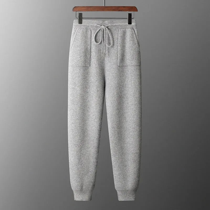 Men's light grey cashmere hooded sweatshirt and trousers leisure set on mannequin