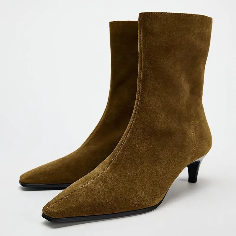 Women's brown square toe ankle boots with a side zipper and a mid-height kitten heel.