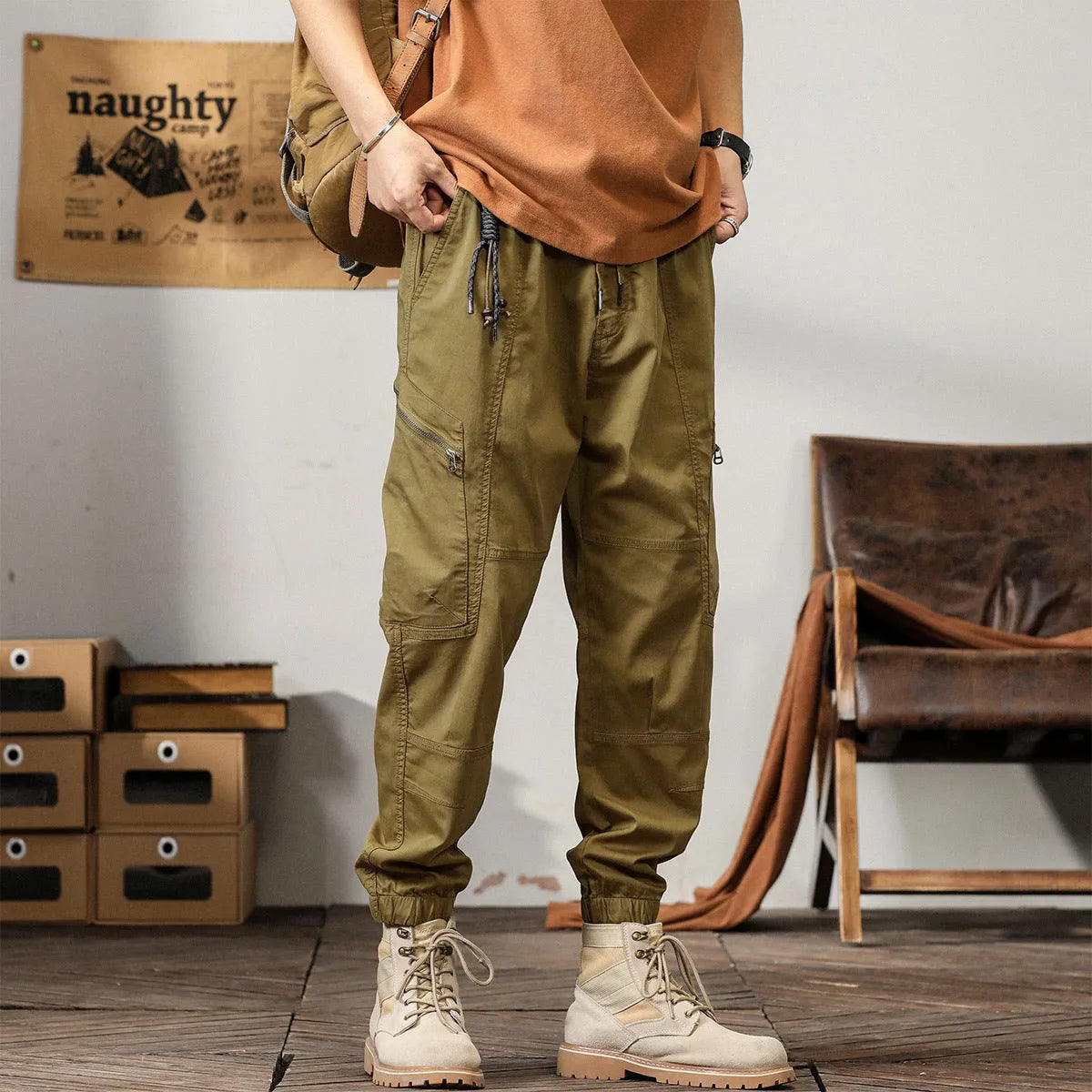 Men's cotton tapered harem trousers in black with elastic waistband and ankle band detailing