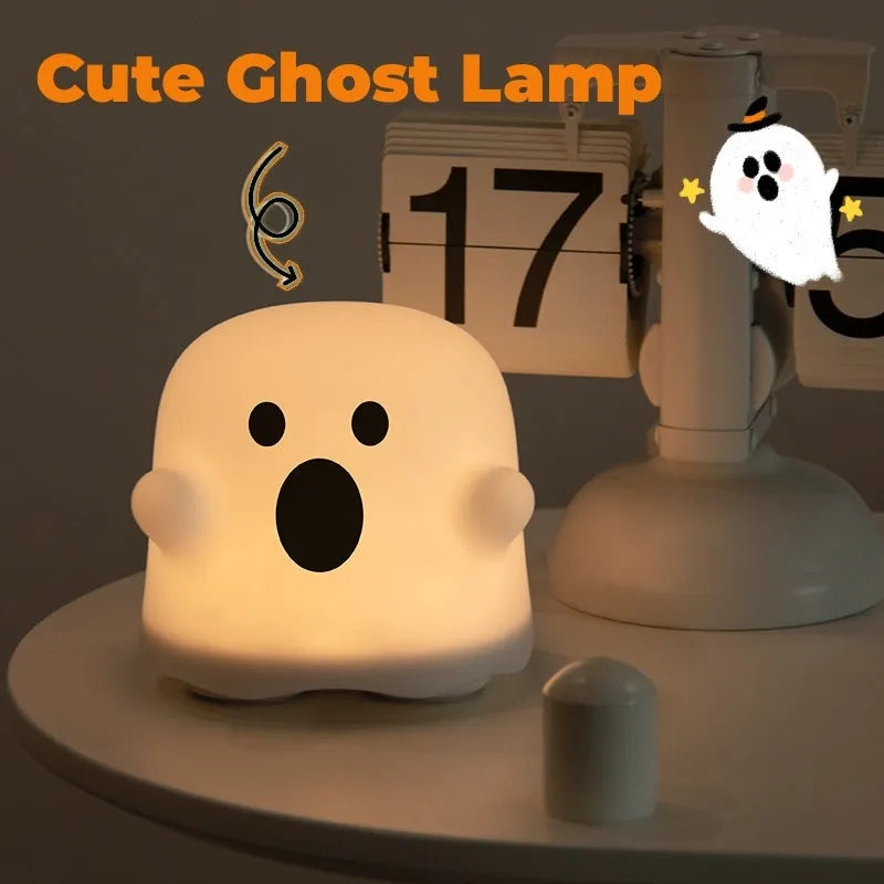 White silicone LED night light with touch sensor base and portable handheld design