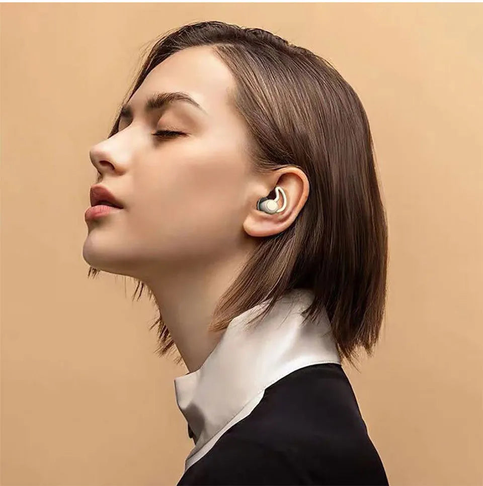 Silicone anti-noise sleep earplugs with shark fin design, 17mm x 14mm, shown in Black and Grey