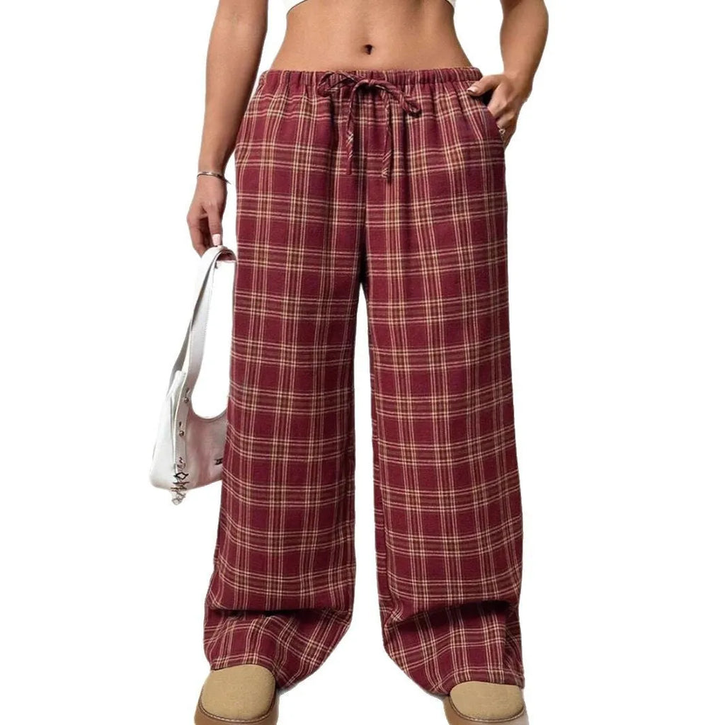 Women's plaid trousers with drawstring waist and multiple pockets in blue or red colours
