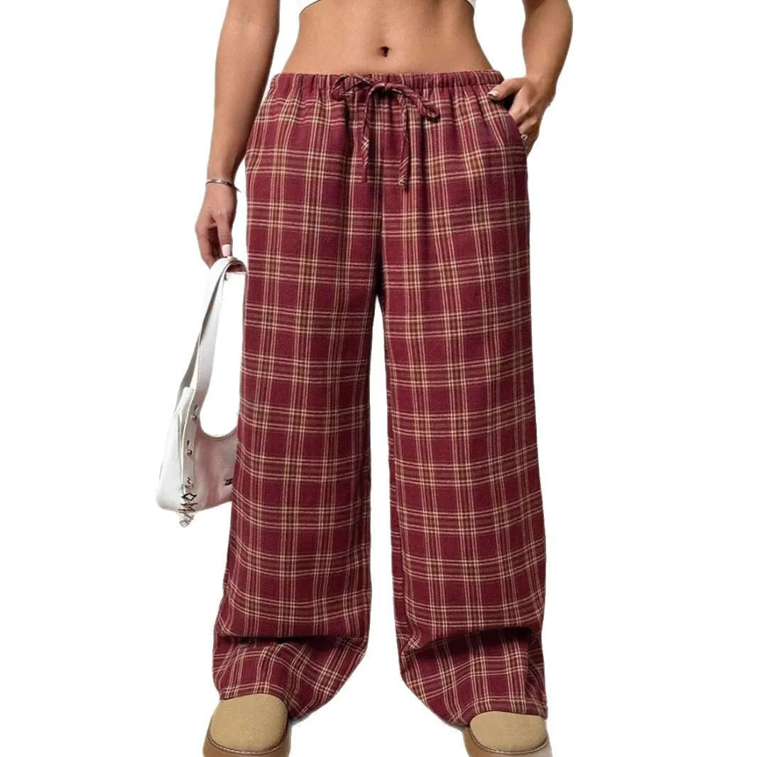 Women's plaid trousers with drawstring waist and multiple pockets in blue or red colours