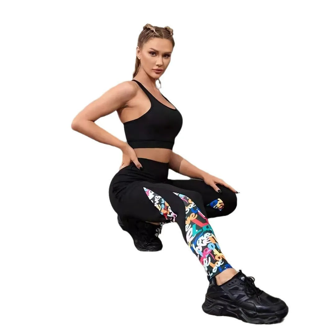 Women's black high-waisted cropped sports leggings with pocket detail and leopard print design