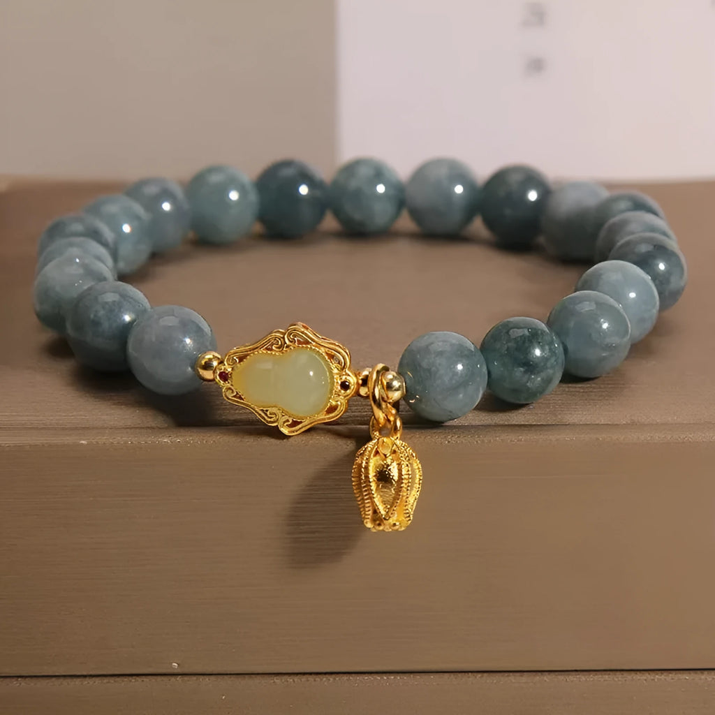 Sky blue natural stone gourd and lotus pendant bracelet for women with electroplated finish.