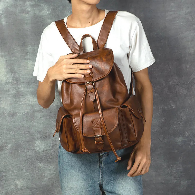 Genuine leather retro backpack with ergonomic back panel and geometric pattern in light brown and black 15 inch