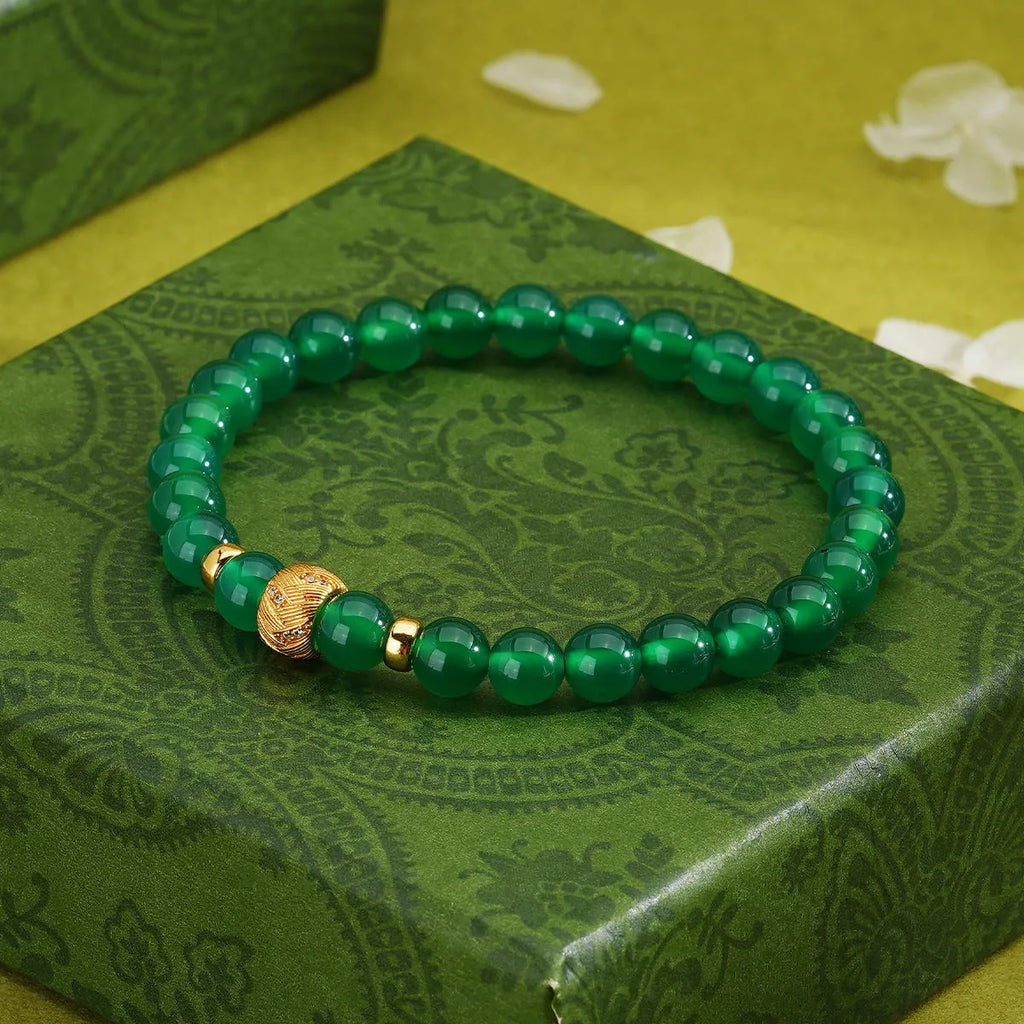 Green agate and sterling silver bracelet with 6mm geometric beads and yellow gold finish