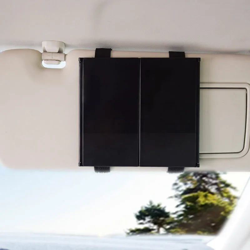 Silver car folding makeup mirror showing closed and open positions