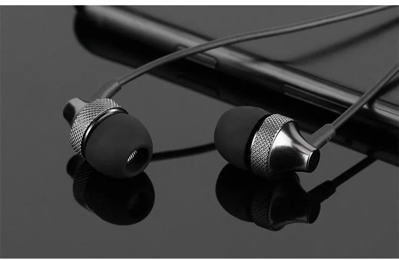 Copper Metal Fever Heavy Bass in-ear headphones with wheat cable and microphone in black colour.