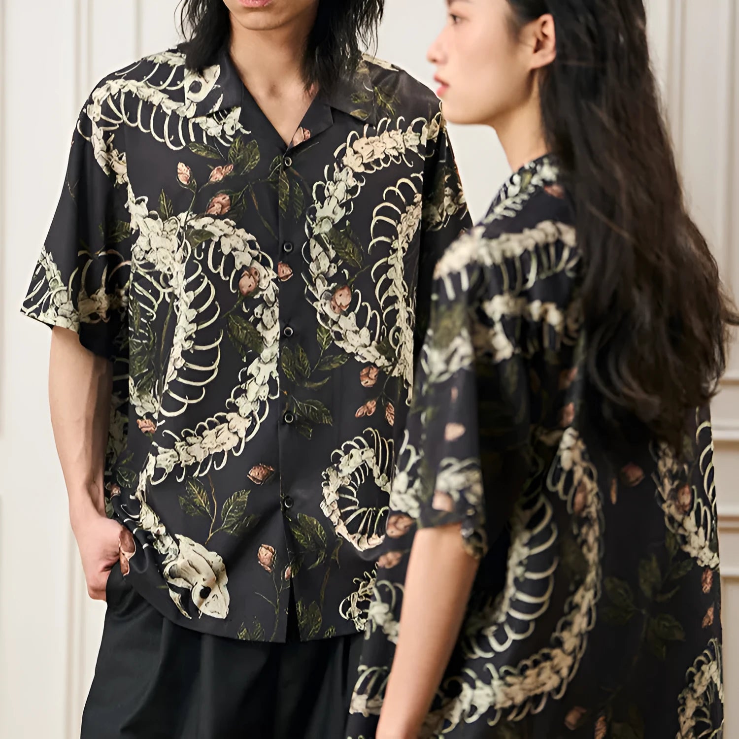 Original snake bone theme floral print on a loose, short sleeve Cuban collar shirt in assorted colours.