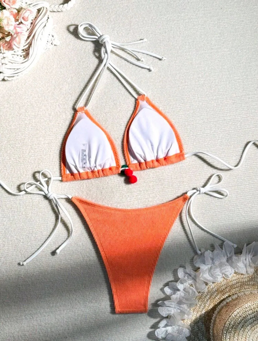 Nylon bikini swimsuit briefs in a solid colour on a mannequin