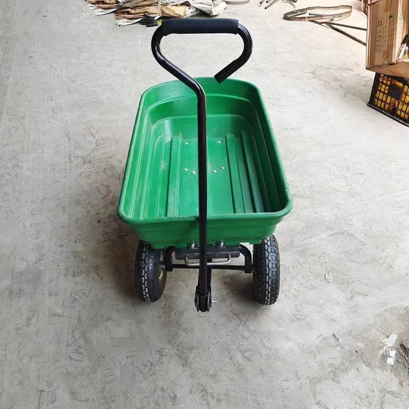 Green four-wheel plastic dump truck with steel frame, model TC2145, for farm and garden use.