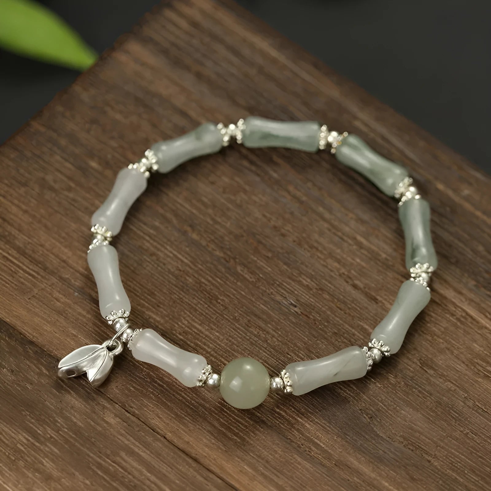 Silver-coloured antique-style bracelet made from natural Tianshan green bamboo with bamboo joint detailing.