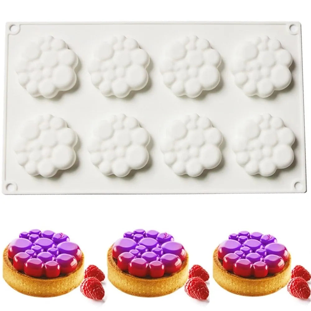 Round silicone cake mould with 8 bubble pattern design for baking and dessert preparation