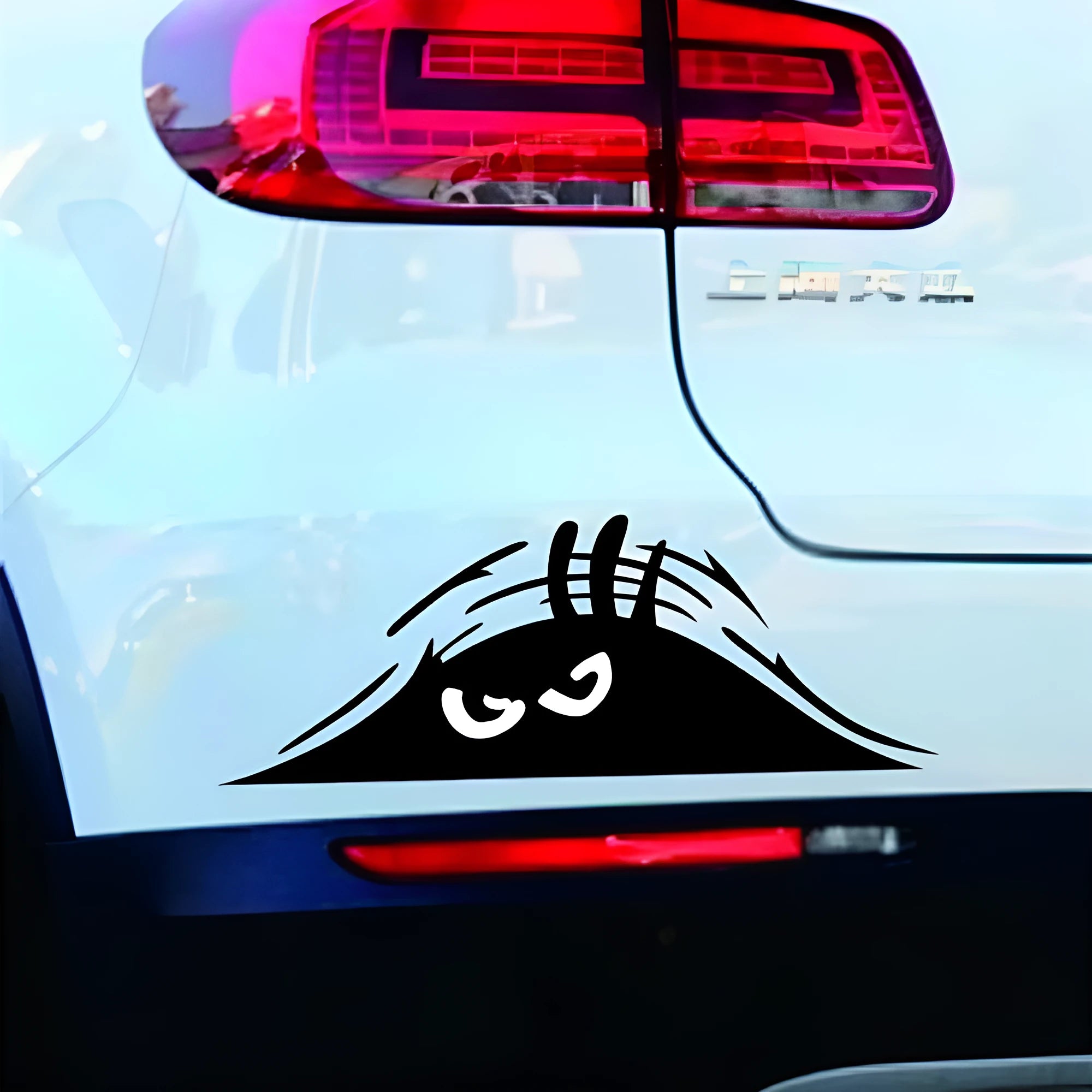 Four self-adhesive body sticker designs on skin including black and colourful smiley faces.