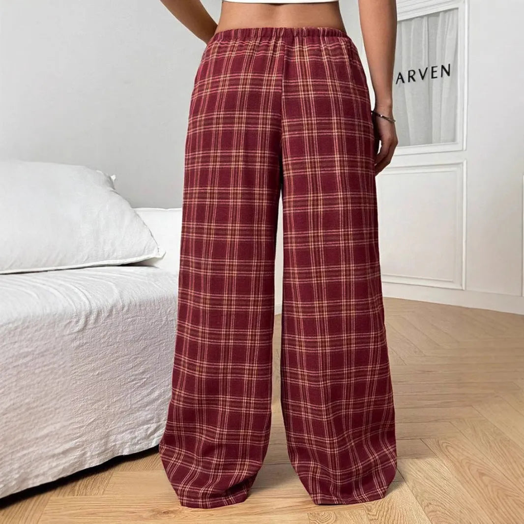 Women's plaid trousers with drawstring waist and multiple pockets in blue or red colours