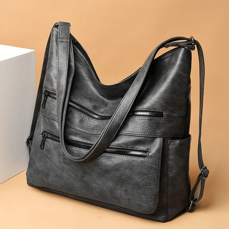 Double zipper shoulder bag for women with adjustable strap, large vertical shape, PU leather, pleated stitching, wine red colour