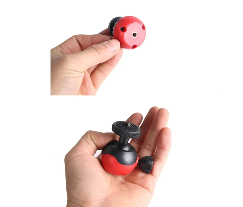 Black octopus-style flexible tripod with spherical gimbal head, shown wrapped around a pole.