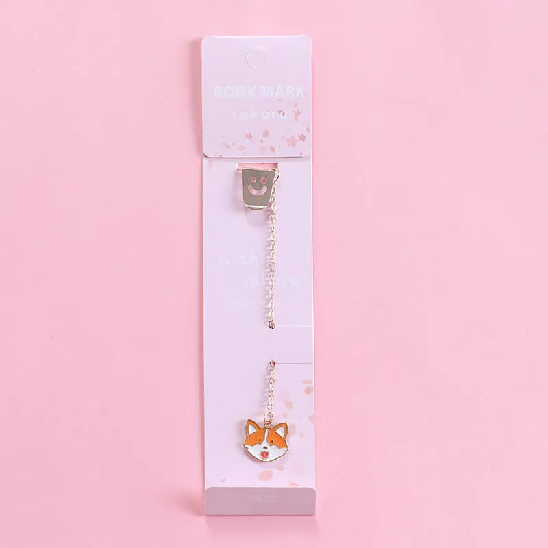 Alloy metal pendant bookmark with cartoon design choices of panda, rocket, cat paw, unicorn, and more.