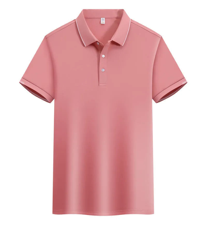 Man wearing a loose fit apricot coloured short sleeve cotton blend polo shirt.