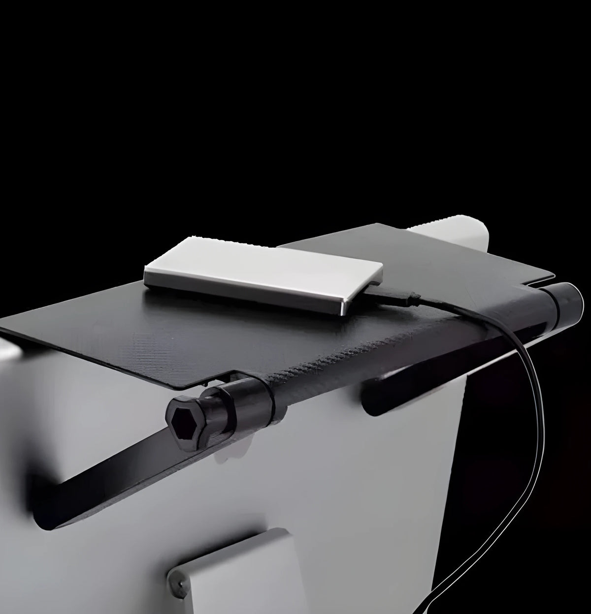 Black adjustable 13-inch screen top shelf for monitor or TV with TV box, router and remote on top.