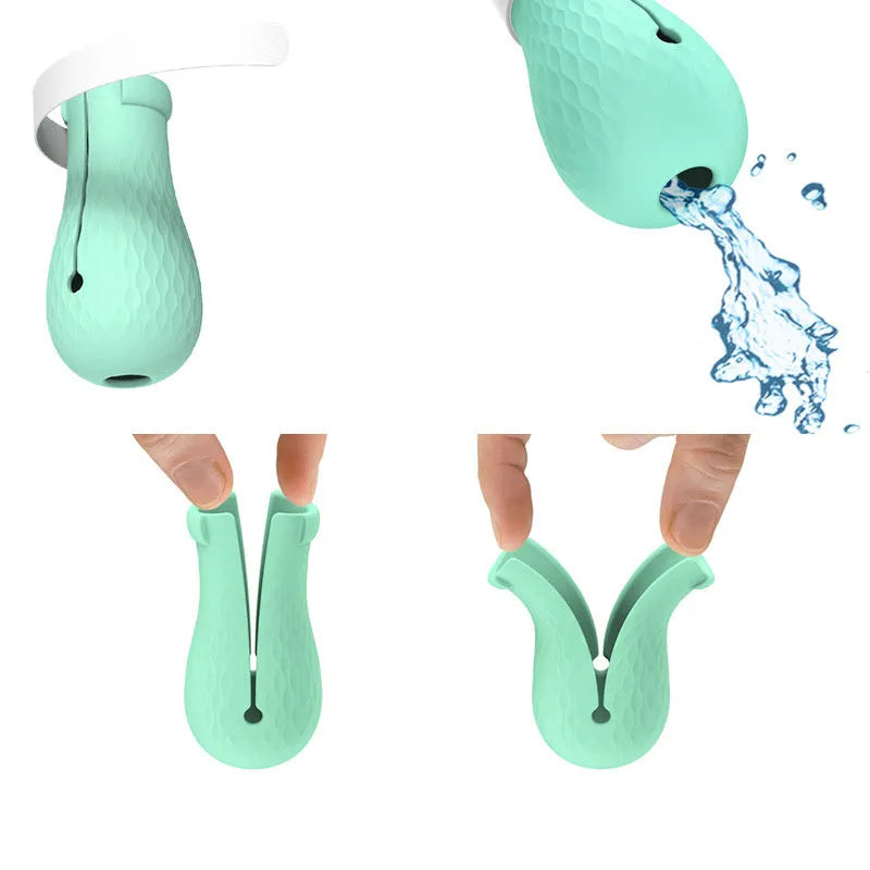Four green silicone cat paw covers for anti-scratch protection during washing and medication