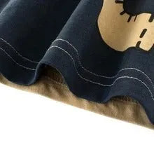 Kids cotton T-shirt with animal prints showing green lion, grey giraffe and khaki elephant designs in sizes 90-140cm