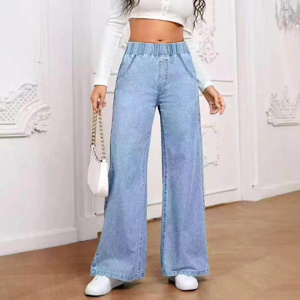 Light blue washed wide-leg straight-cut jeans on a hanger, showing mid-waist and zip fly detail.
