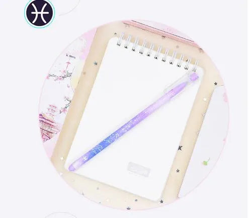 Boxed set of 12 constellation-themed quick-drying gel pens with plastic barrels.