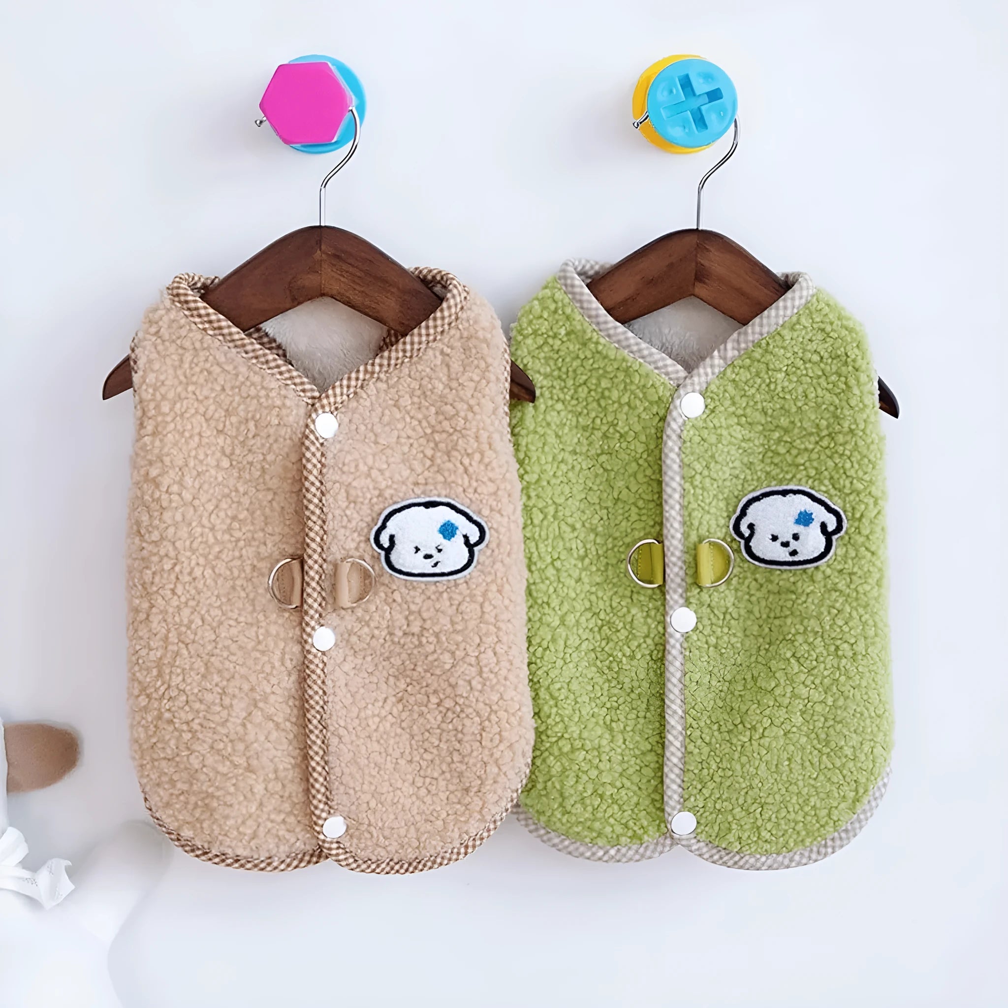 Green coral fleece dog sweatshirt vest on a small dog, showing the collar leash ring.