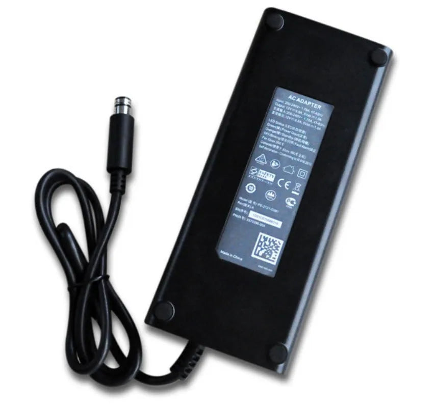 Black Xbox 360 E AC power adapter with detachable cable and UK/EU/US plug options