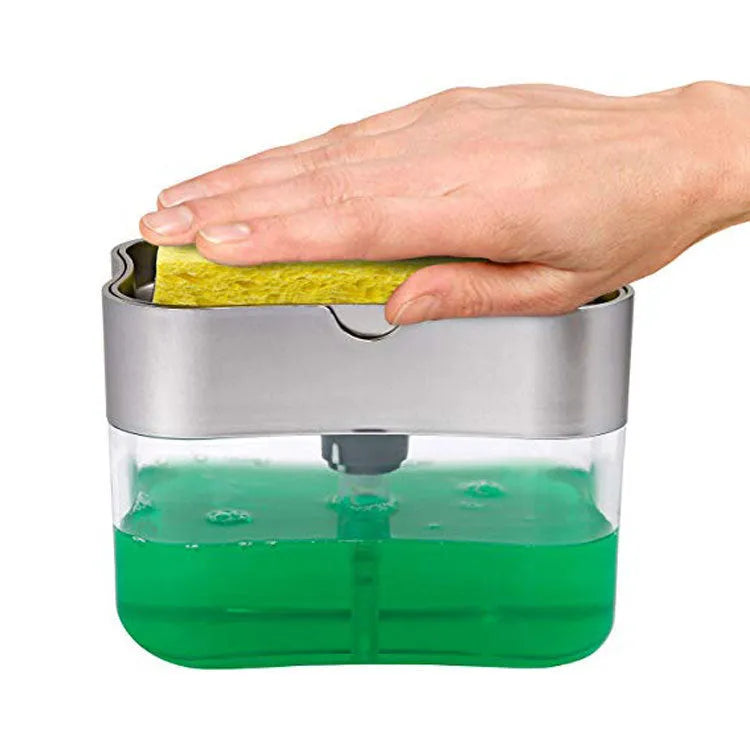 A grey plastic soap dispenser with a pump, sitting on a kitchen countertop.