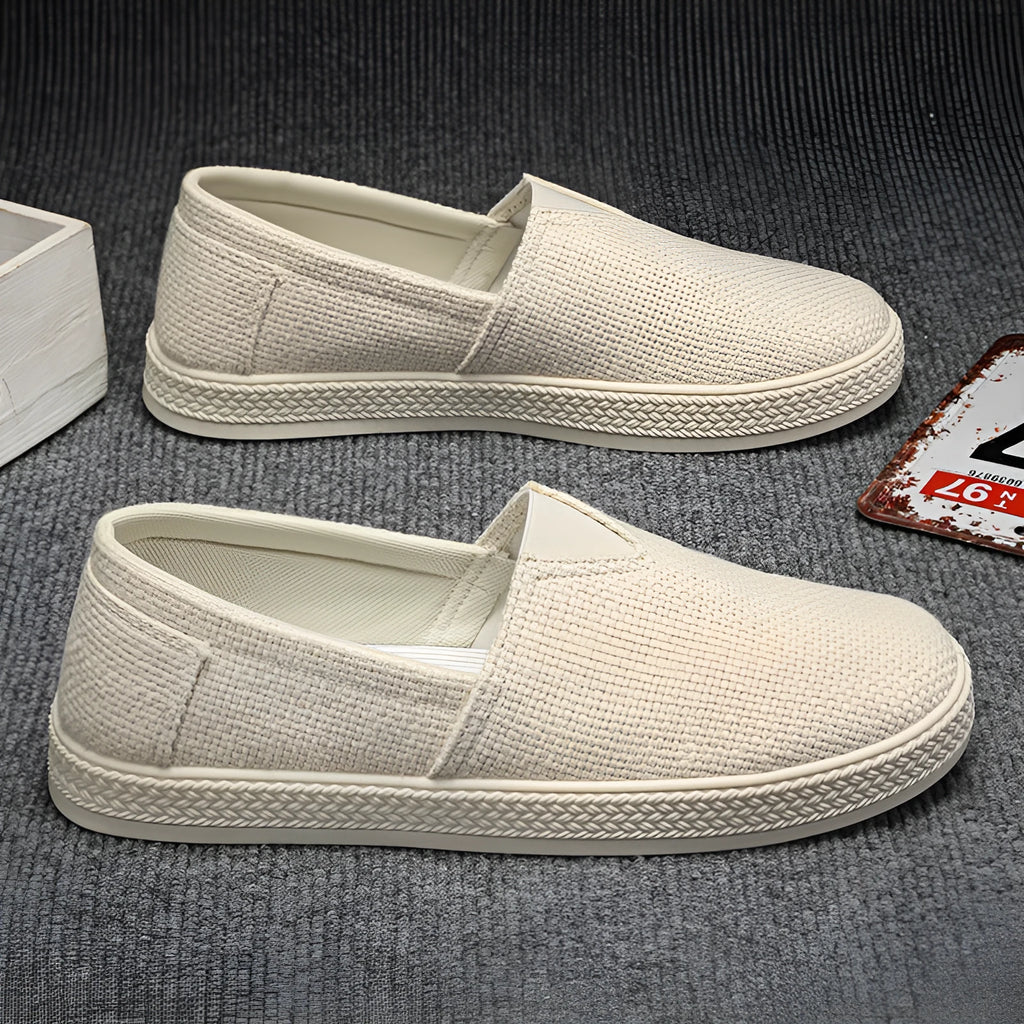 Men's beige canvas shoes with round toe and shallow mouth design on PVC sole