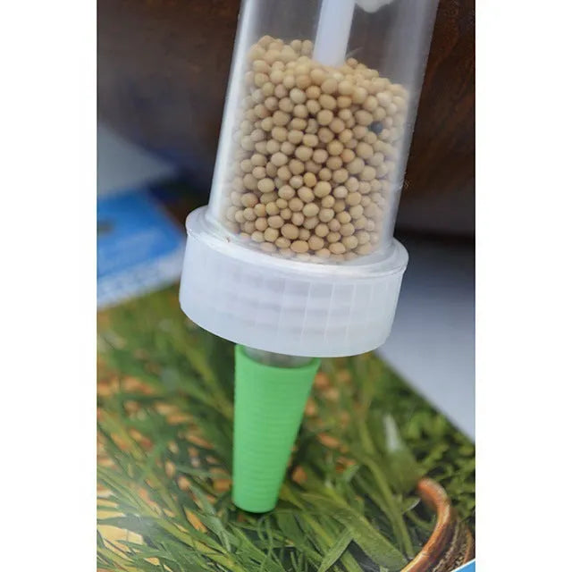 Plastic mini garden planter tool with 12cm length and 3cm diameter for seed distribution