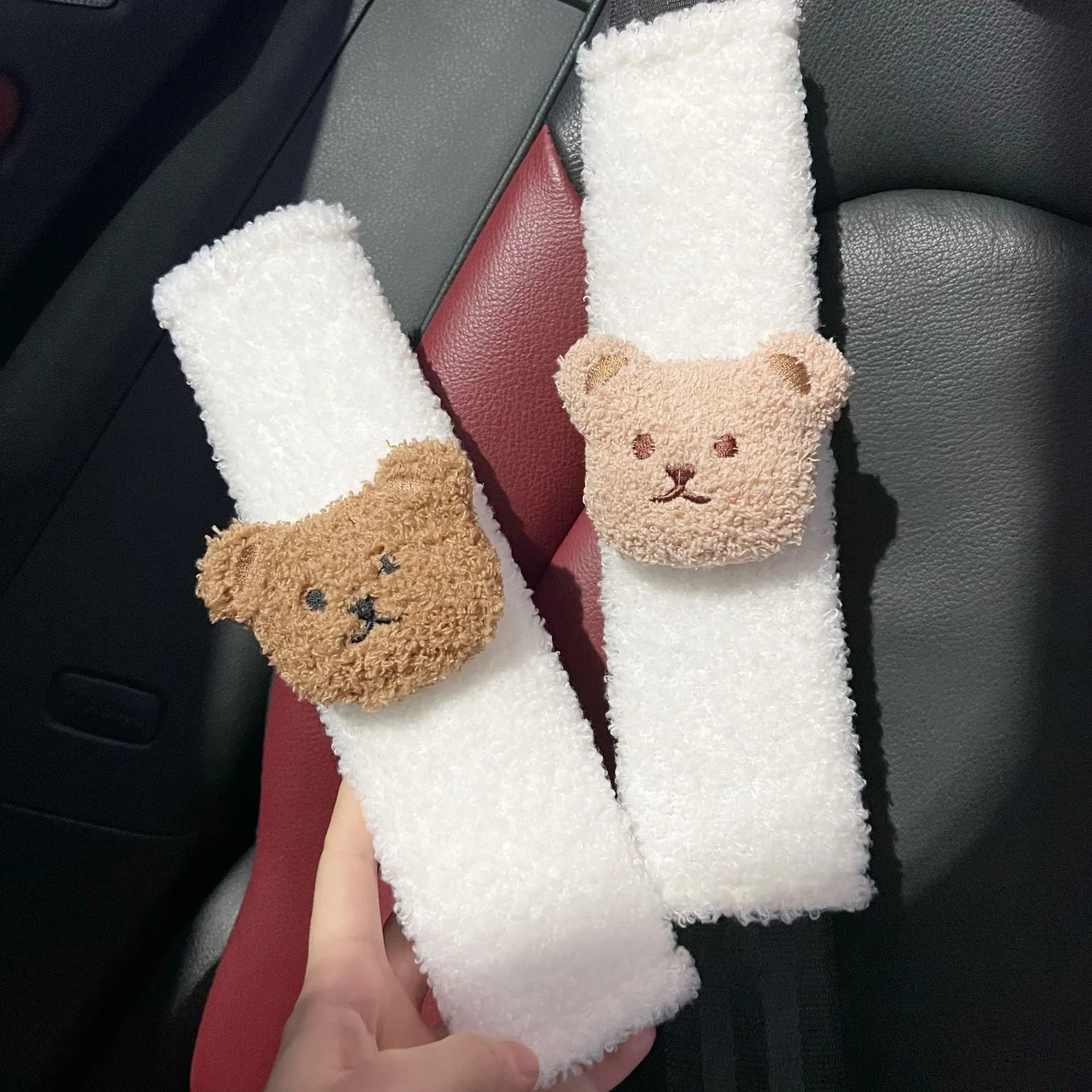 Cartoon bear plush seat belt shoulder cover for child car safety measuring 25cm by 6.5cm by 5cm.