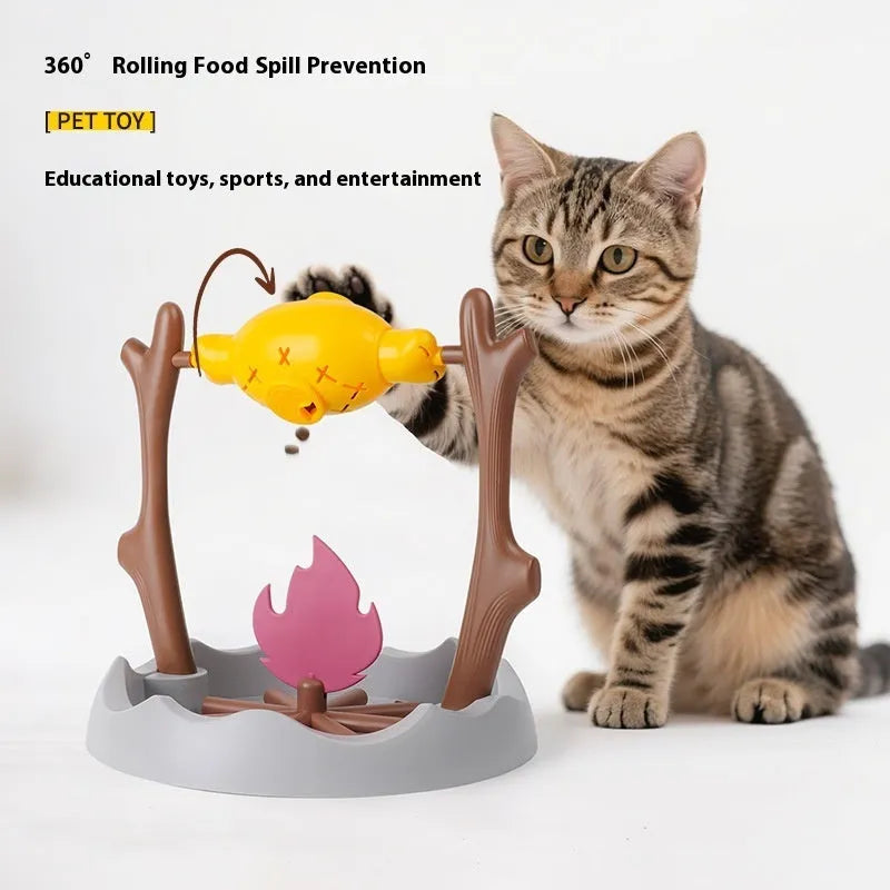 Barbecue style tumbling cat feeder toy for interactive food puzzle play.