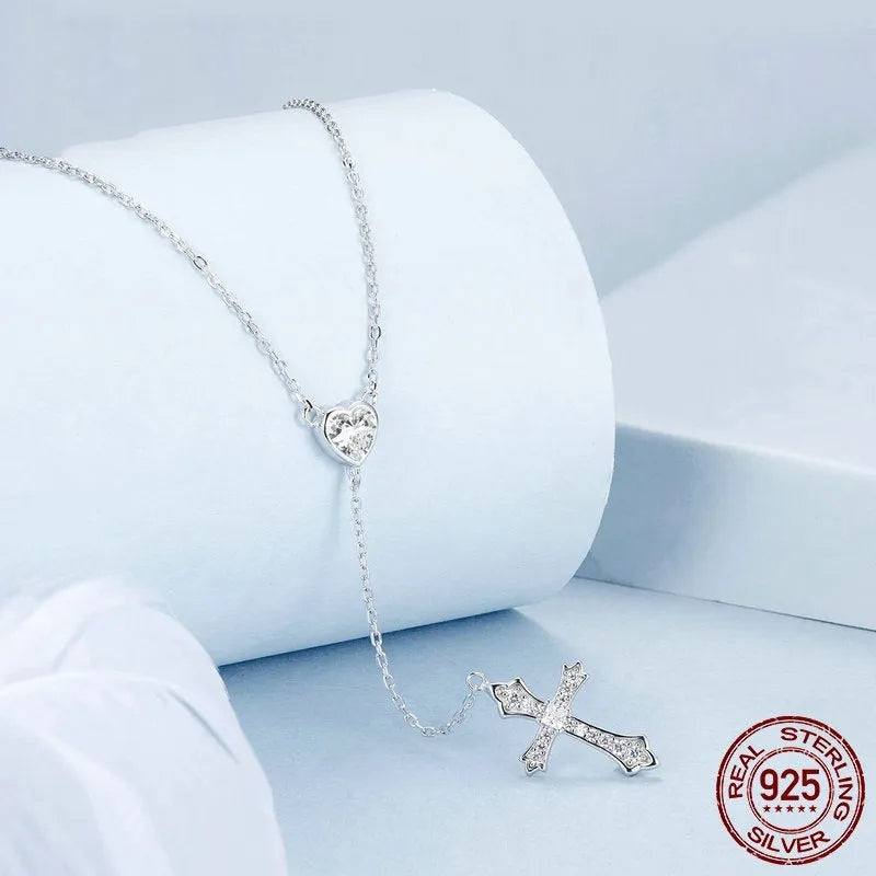 Women's silver V-neck love cross necklace with O-ring chain in BSN384 colour