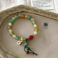 M990 Lotus Ruyi bracelet with mixed materials and lotus element