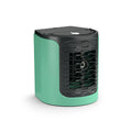 Desktop air conditioning fan in white or green, 16 x 15.5 x 17.3 cm, with 150ml water tank and USB cable