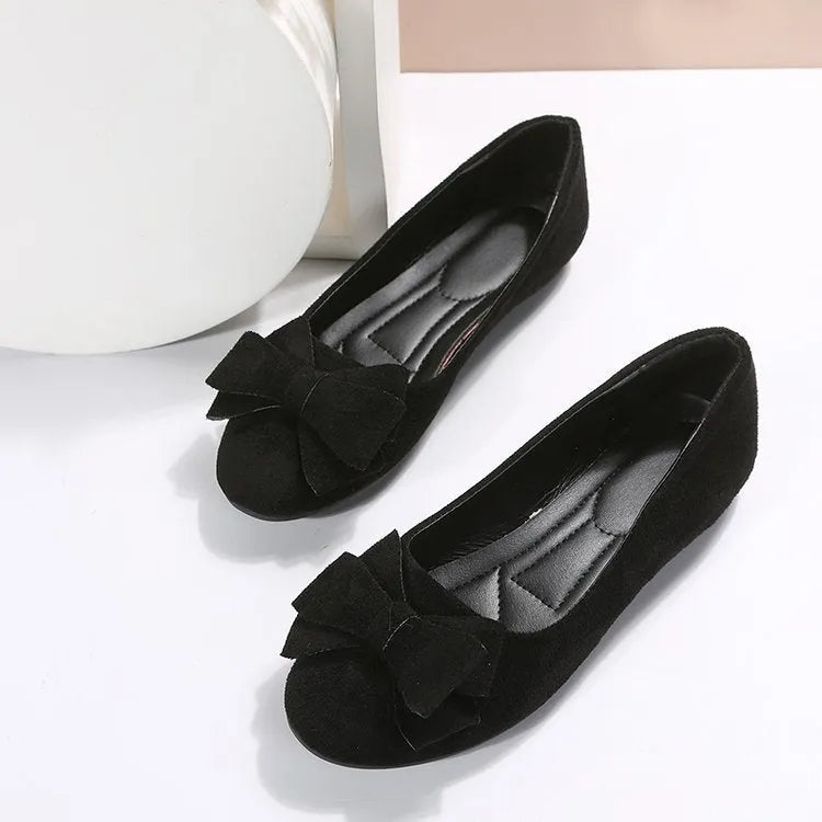 Women's bowknot flats with round toe, flat heel, low upper and rubber sole in black, green or red