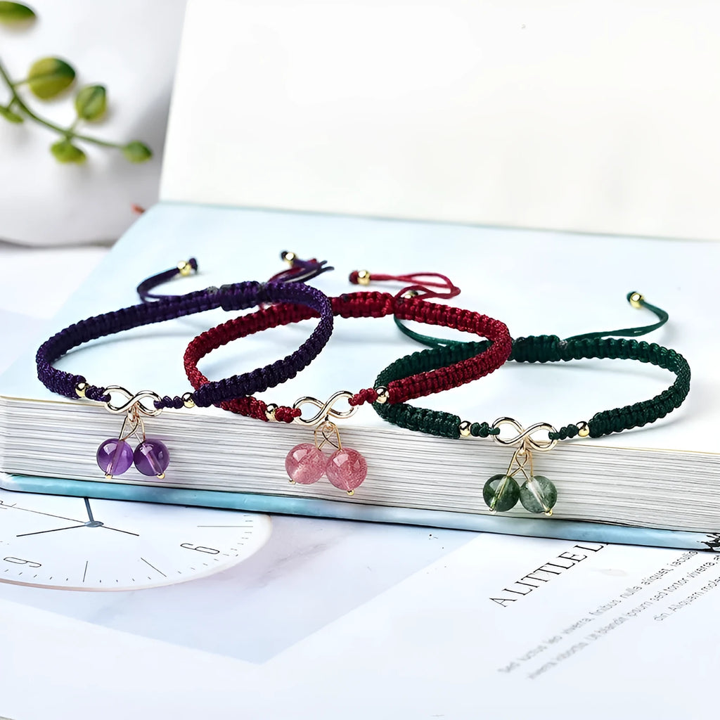 Natural Strawberry Quartz cherry-shaped bracelet for women on a white background.