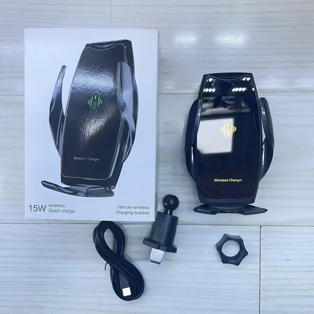 Snap-on wireless charger mobile phone holder in black finish on a desk