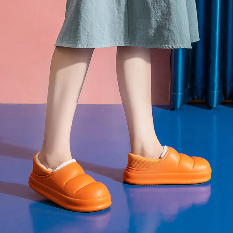 Women's waterproof winter house slippers in various colours with EVA construction and non-slip sole
