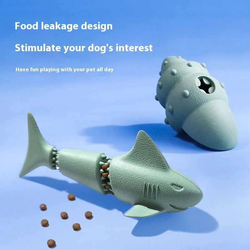 Blue and green deep sea shark, conch, and starfish-shaped rubber dog toys for food leakage and interactive play.